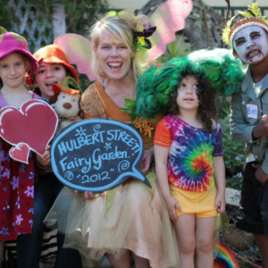 A group of children dressed up in fairy costumes.