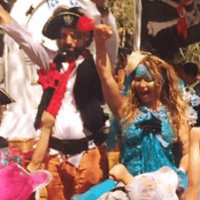 A group of people dressed up in pirate costumes.